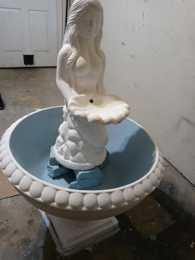 Mermaid shell fountain in the Villa Rica shop before delivery