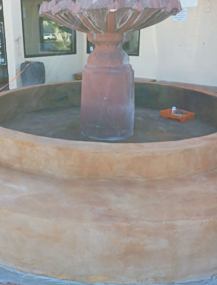 Smooth resurfaced fountain basin ready for its new finish